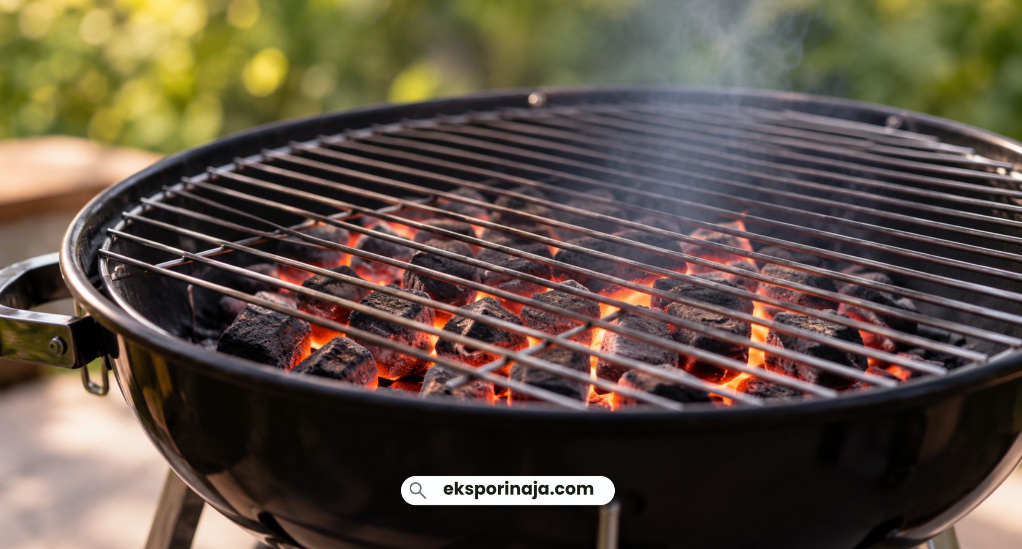 Glowing charcoal briquettes beneath a BBQ grill grate in an outdoor grilling setup